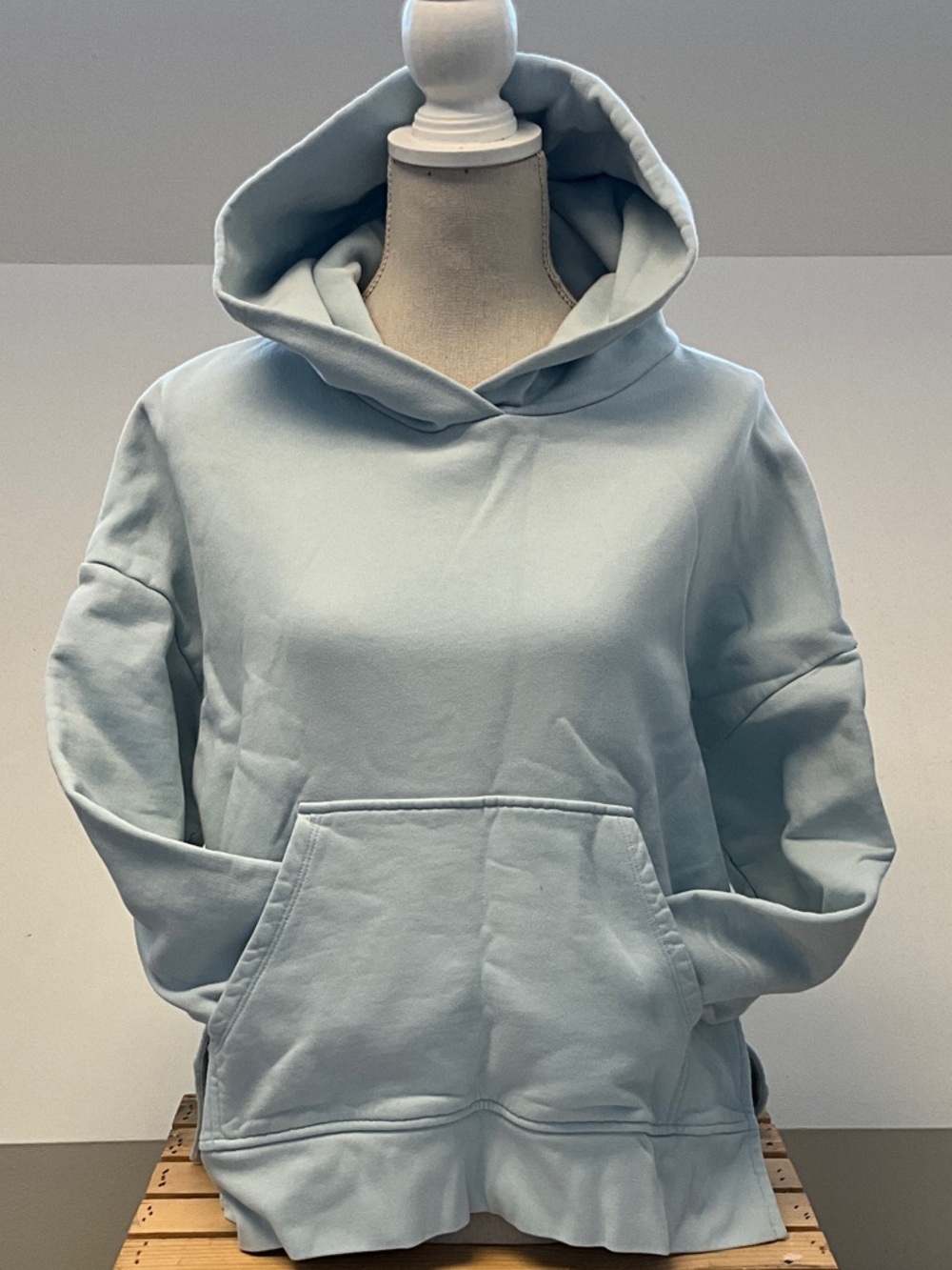Closed light blue hoodie